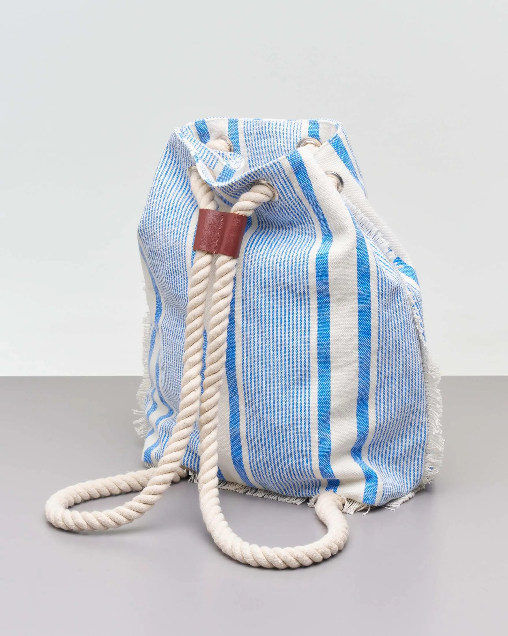 Sacca a zaino da mare in canvas di cotone bianca con righe azzurre