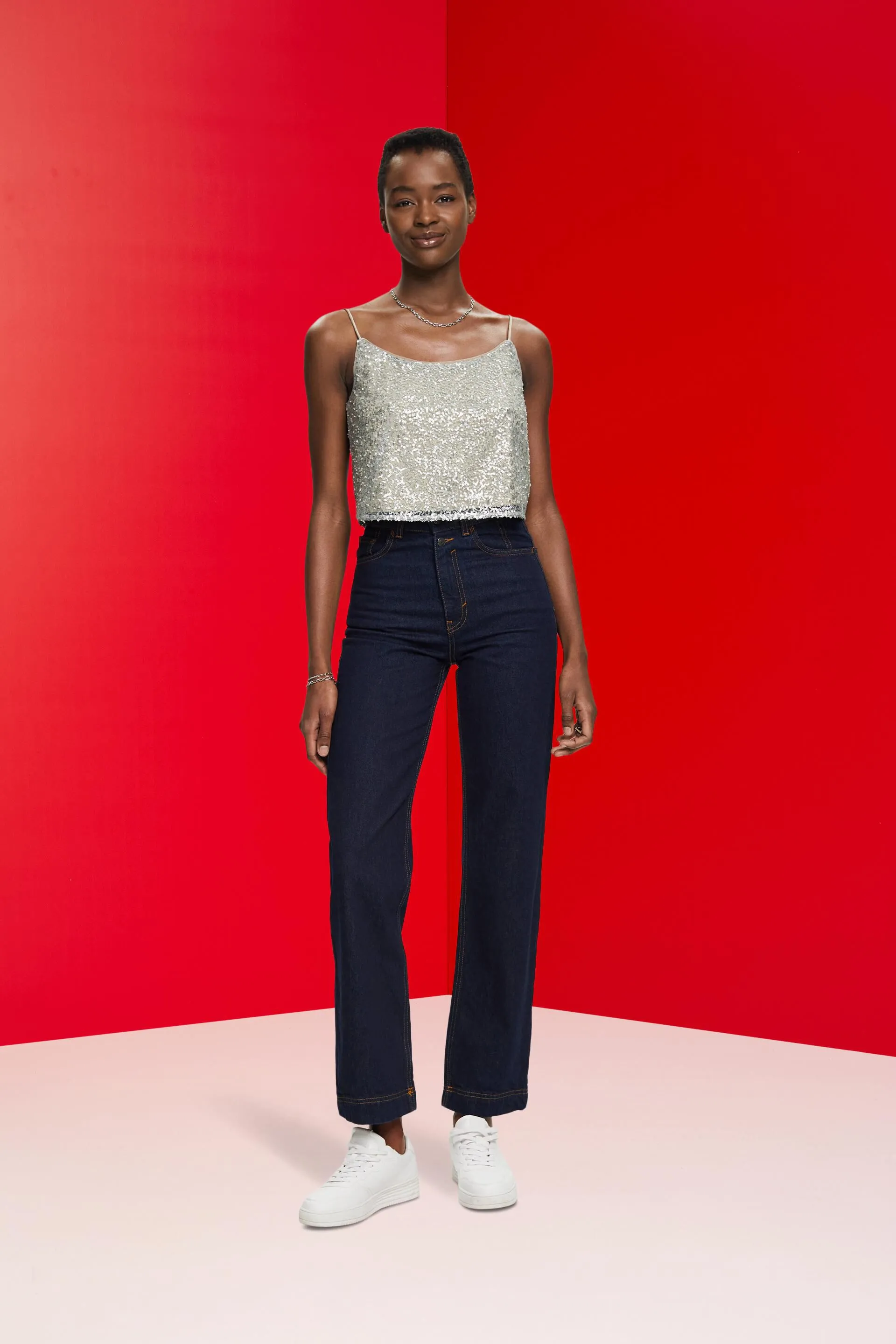 Top accorciato con paillettes scintillanti