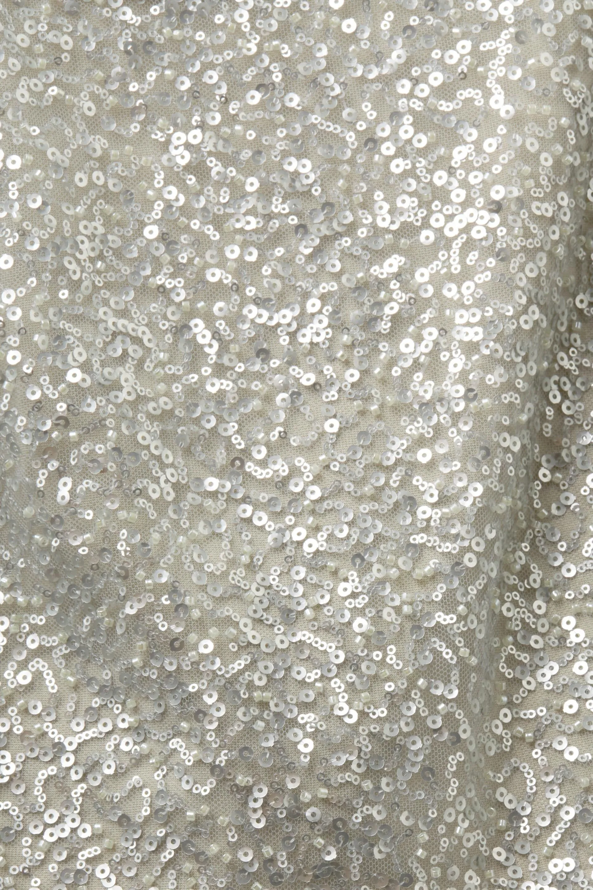 Top accorciato con paillettes scintillanti